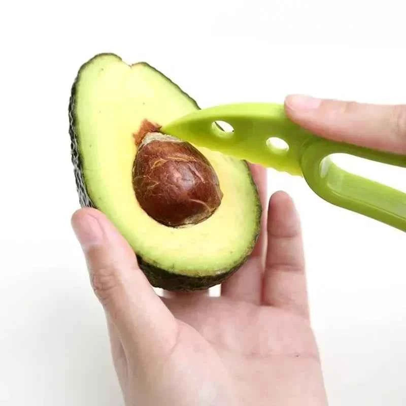 Green 3-in-1 avocado tool kit by Corporación Turística with slicer and pitter for easy avocado preparation.