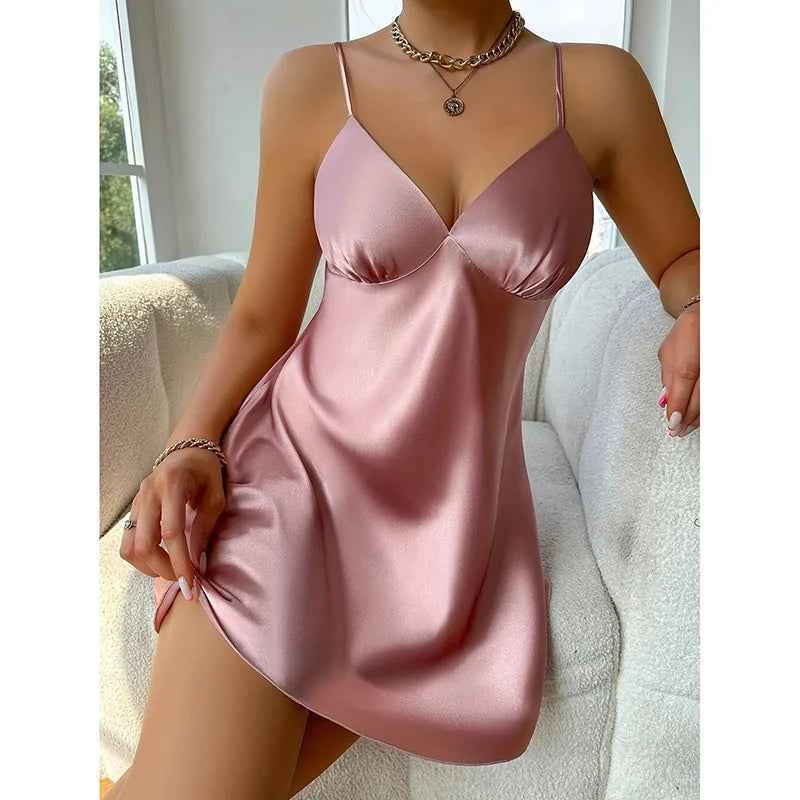 Elegant green satin camisón for women, one-piece sleepwear with shoulder straps, by Corporación Turística.