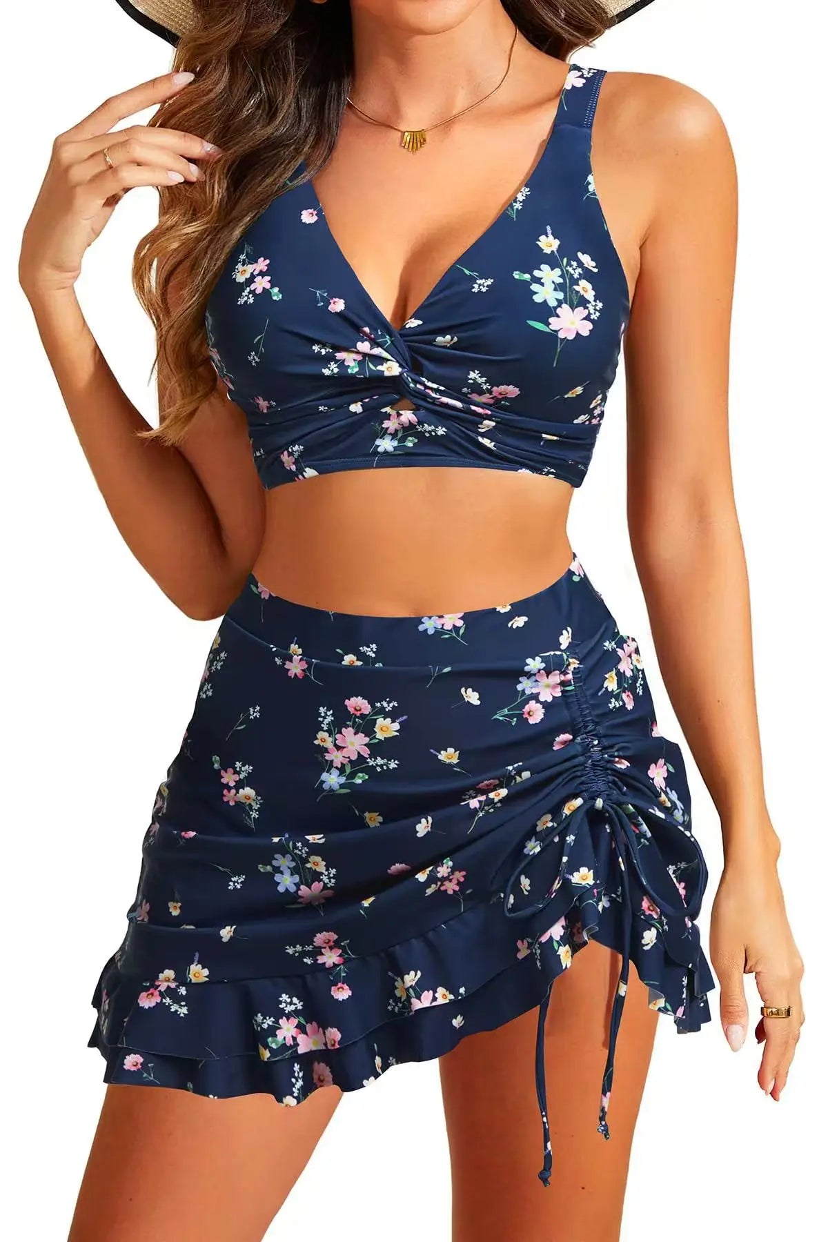 Floral print women's two-piece swimsuit by Corporación Turística, featuring a vibrant green design and stylish fit.