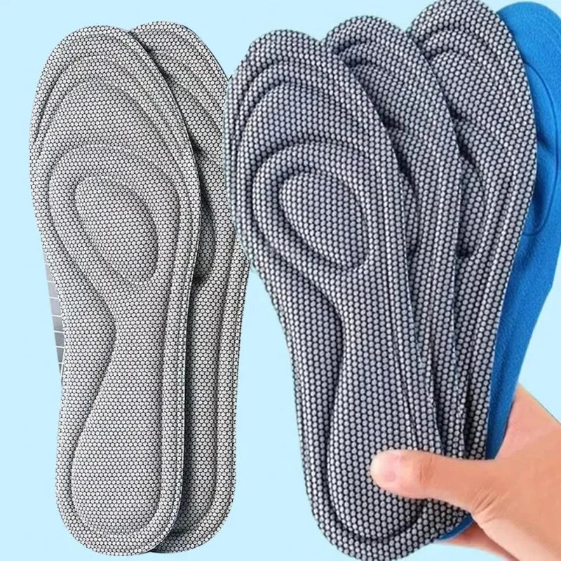 Set of 10 pairs of gray orthopedic viscoelastic foam insoles from Corporación Turística, designed for comfortable foot support.