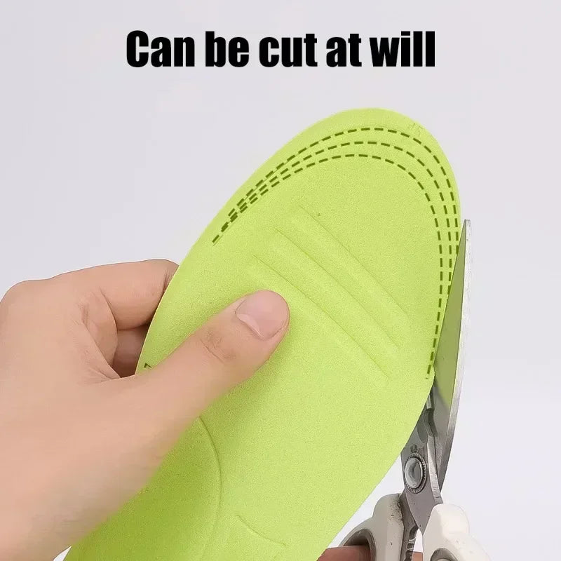 Pair of unisex viscoelastic foam orthopedic insoles by Corporación Turística, shown in grey for shoe sizes 43-44.