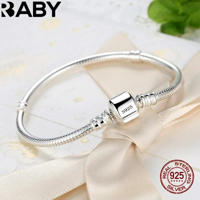 Handmade fine silver bracelet from Corporación Turística, showcasing intricate craftsmanship and polished silver finish.