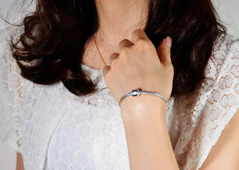 Handmade fine jewelry silver bracelet by Corporación Turística, featuring intricate design and polished finish.