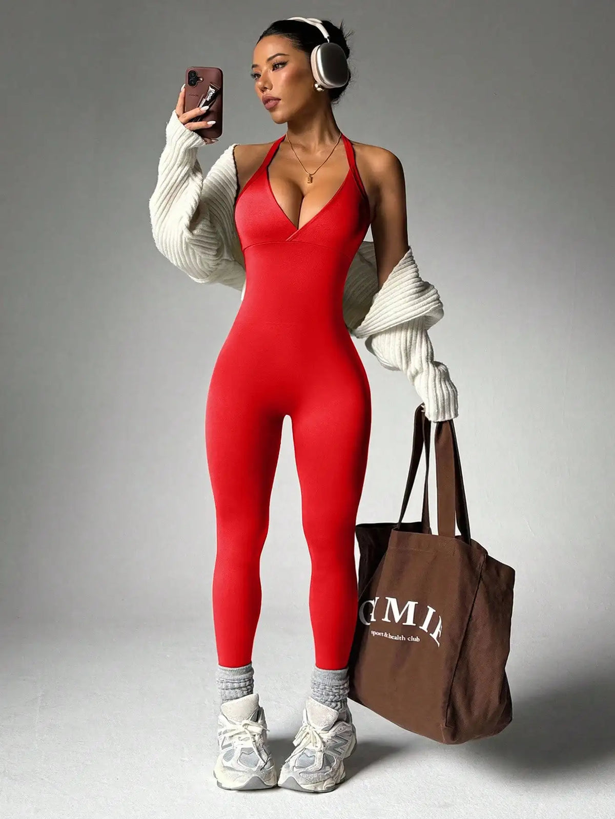 Yoga compression leggings by Corporación Turística, sleeveless backless and sleeveless design, shown on a model.