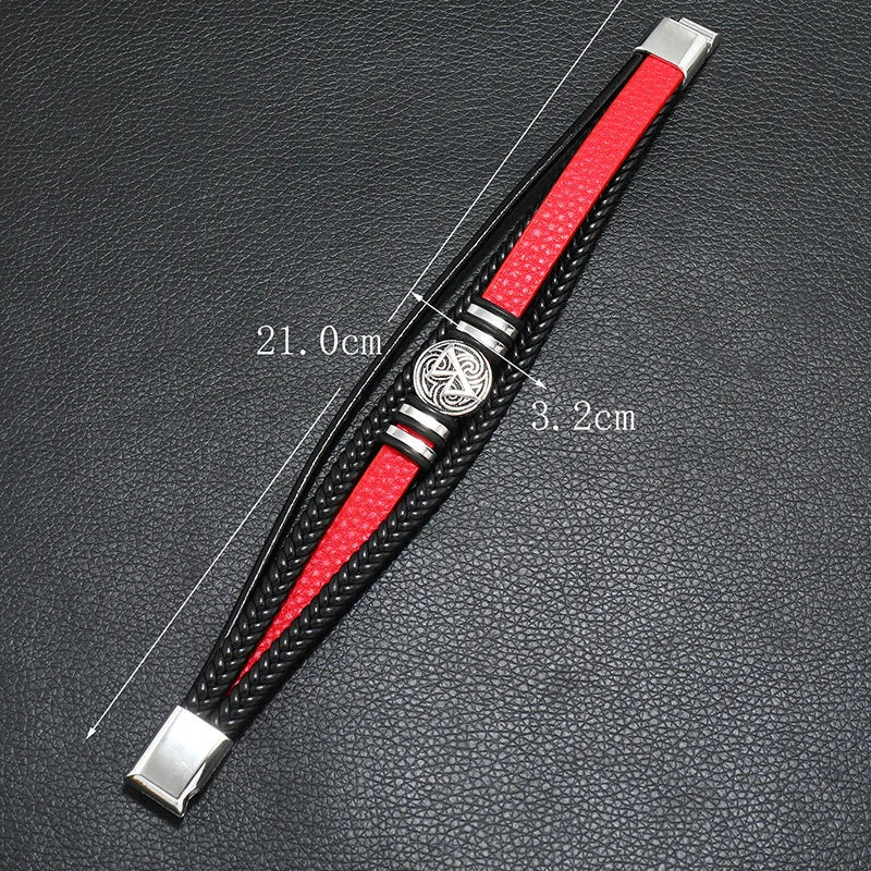 Black leather men's bracelet with multi-layer braided design, featuring a compass and evil eye charms, from Corporación Turística.