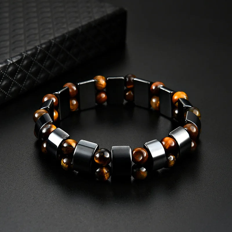 Elegant men's Tiger Eye bracelet featuring natural, durable stones, showcasing a polished red gemstone in jewelry style.