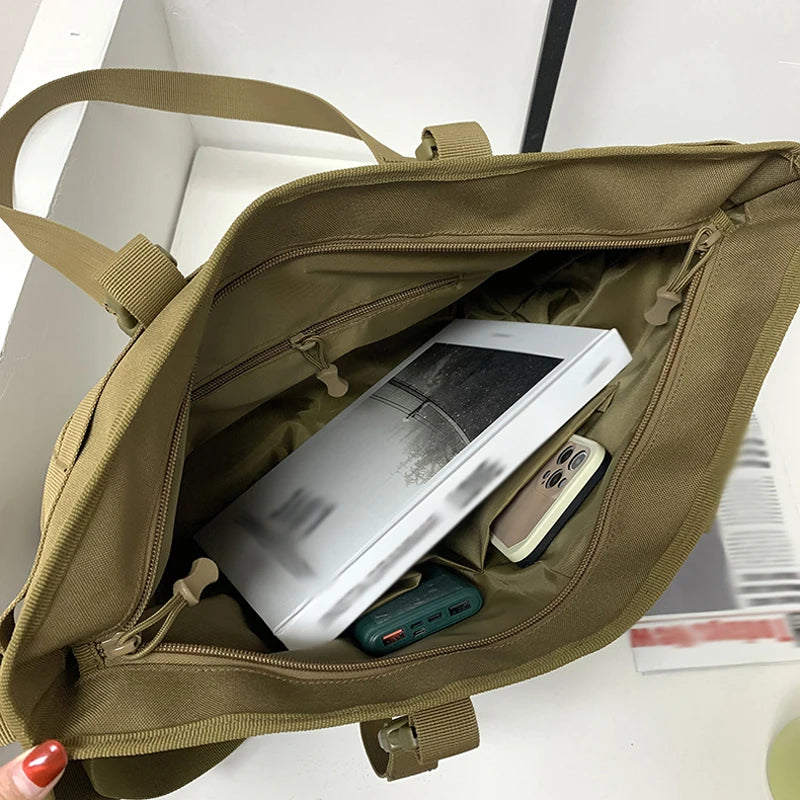 Large khaki gym and fitness tote bag by Corporación Turística with a sturdy hook and spacious interior.