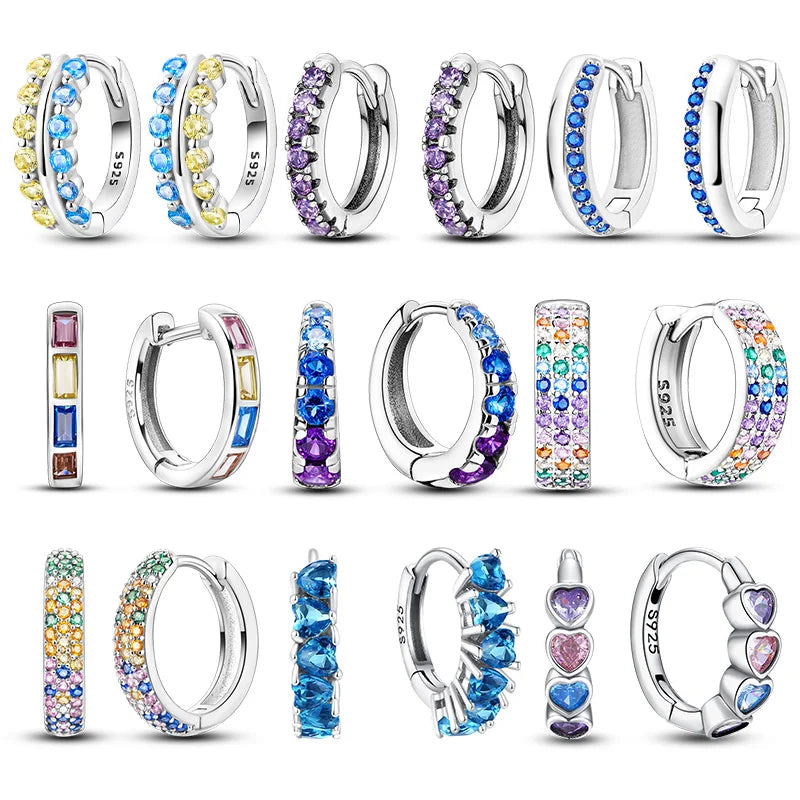 Colorful sterling silver earrings with vibrant circular design from Corporación Turística, handcrafted jewelry for women.