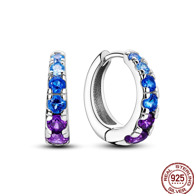 Colorful sterling silver 925 hoop earrings from Corporación Turística featuring vibrant circular design.