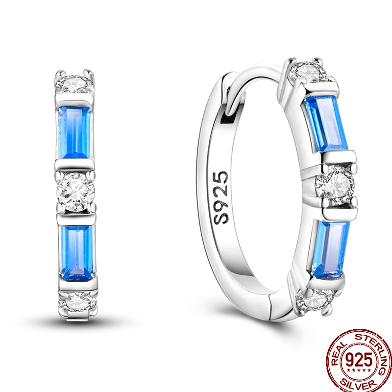 Colorful sterling silver 925 earrings featuring circus-inspired design, crafted by Corporación Turística.