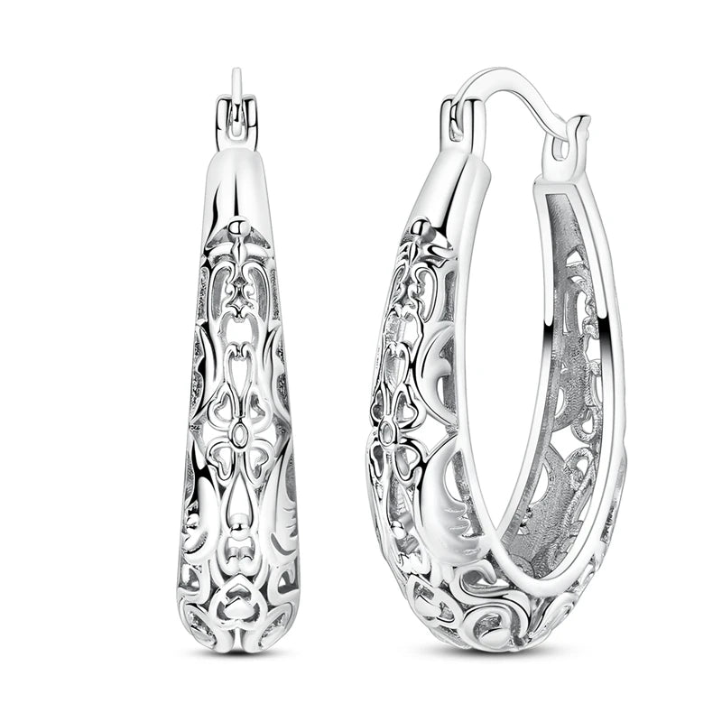 Sterling silver hoop earrings by Corporación Turística, stylish and original jewelry featuring high-quality 925 silver.
