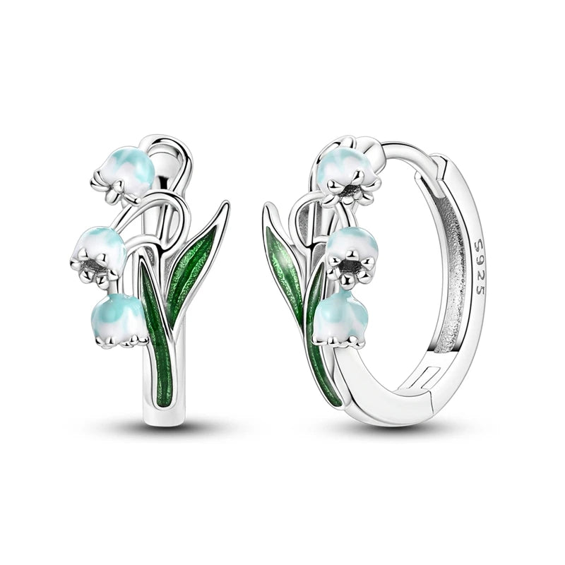 Sterling silver hoop earrings with a classic design, from Corporación Turística, featuring polished silver finish.