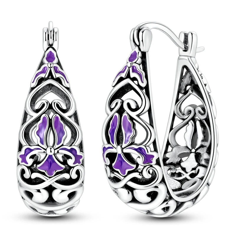 Sterling silver hoop earrings by Corporación Turística, stylish and original jewelry featuring shiny 925 silver hoops.