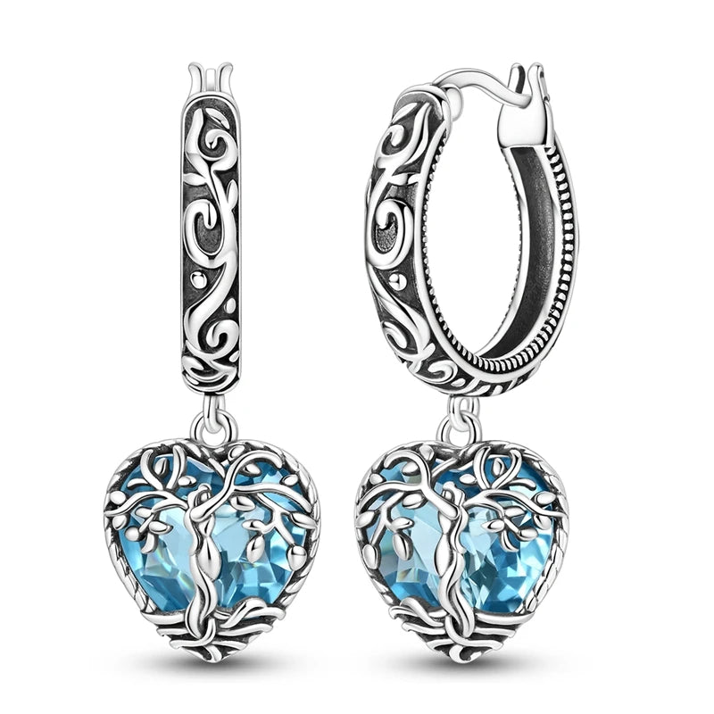 Sterling silver hoop earrings from Corporación Turística, original jewelry, shiny round silver hoops with smooth finish.