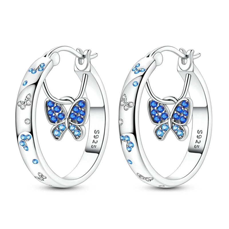 Silver 925 hoop earrings from Corporación Turística, original jewelry with stylish round design, shiny finish, and secure clasps.