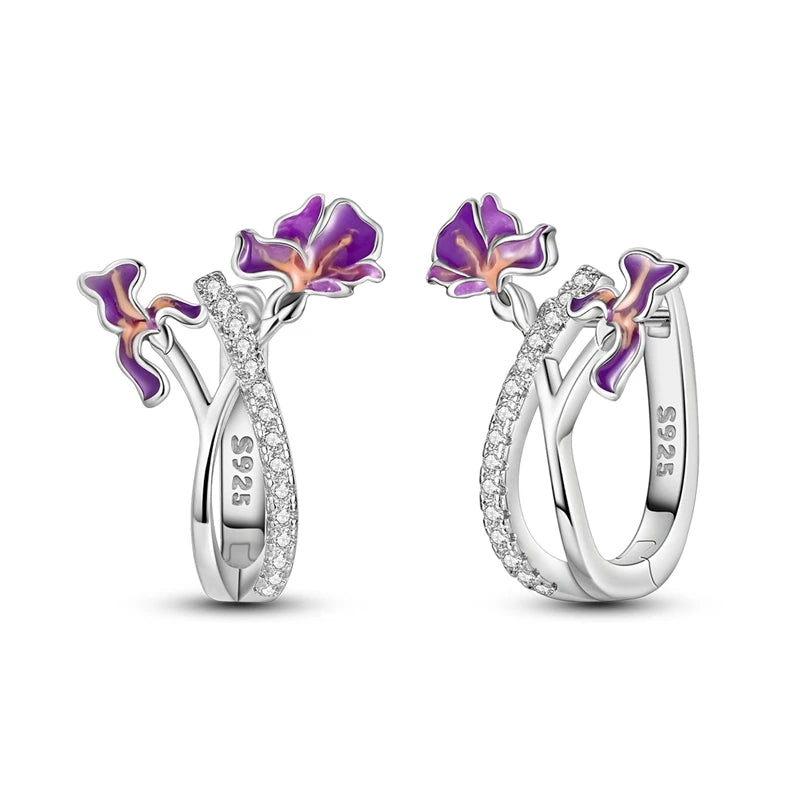 Original sterling silver hoop earrings by Corporación Turística, stylish jewelry with a polished, rounded design for everyday wear.