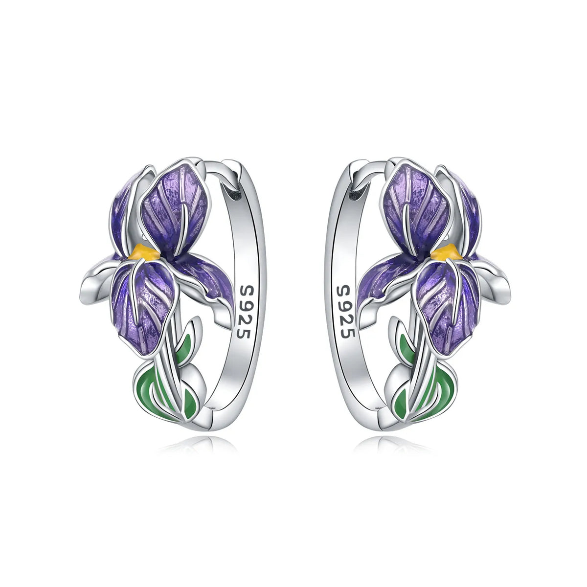 Silver hoop earrings by Corporación Turística featuring leaf and flower design, showcasing intricate nature-inspired jewelry.