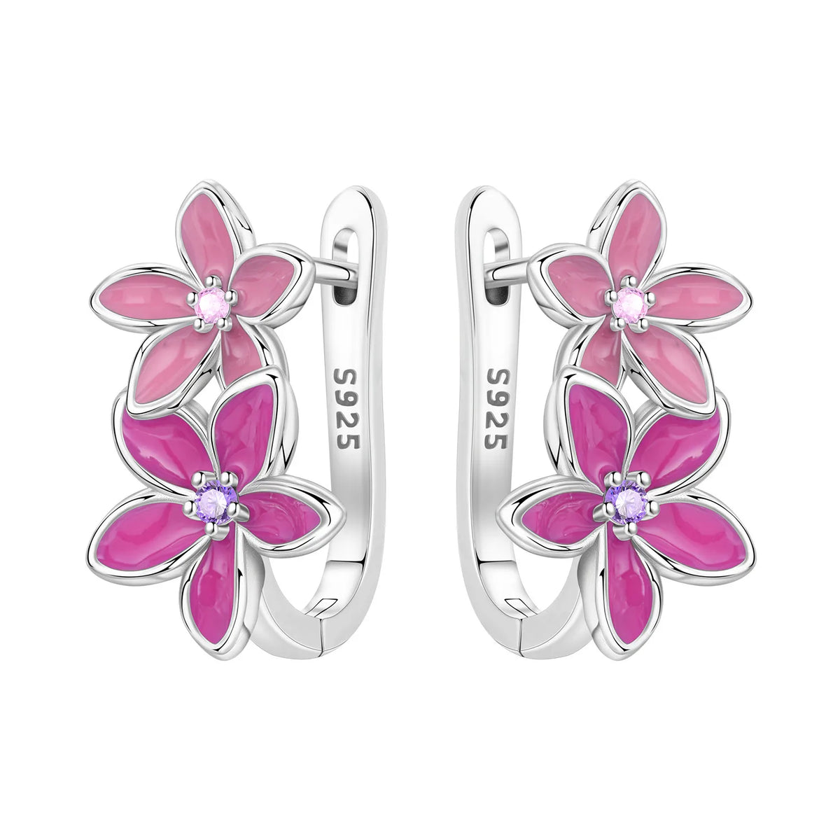 Silver hoop earrings with leaf and flower design, crafted by Corporación Turística, featuring intricate botanical details.
