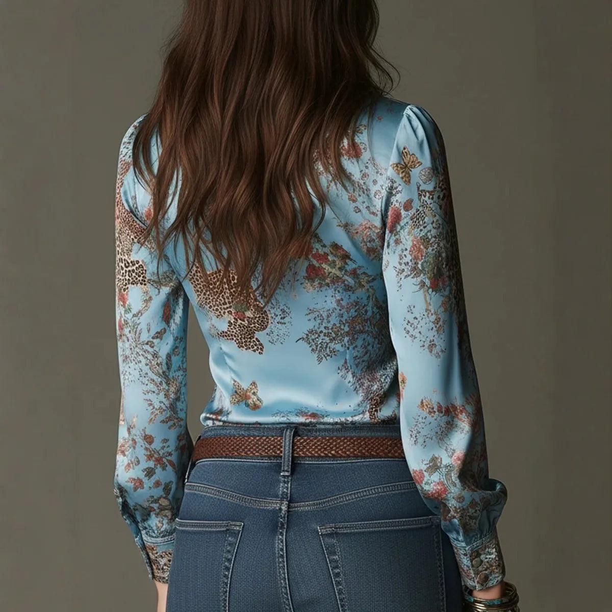 Light blue European and American style women's blouse by Corporación Turística, featuring a relaxed fit and stylish design.