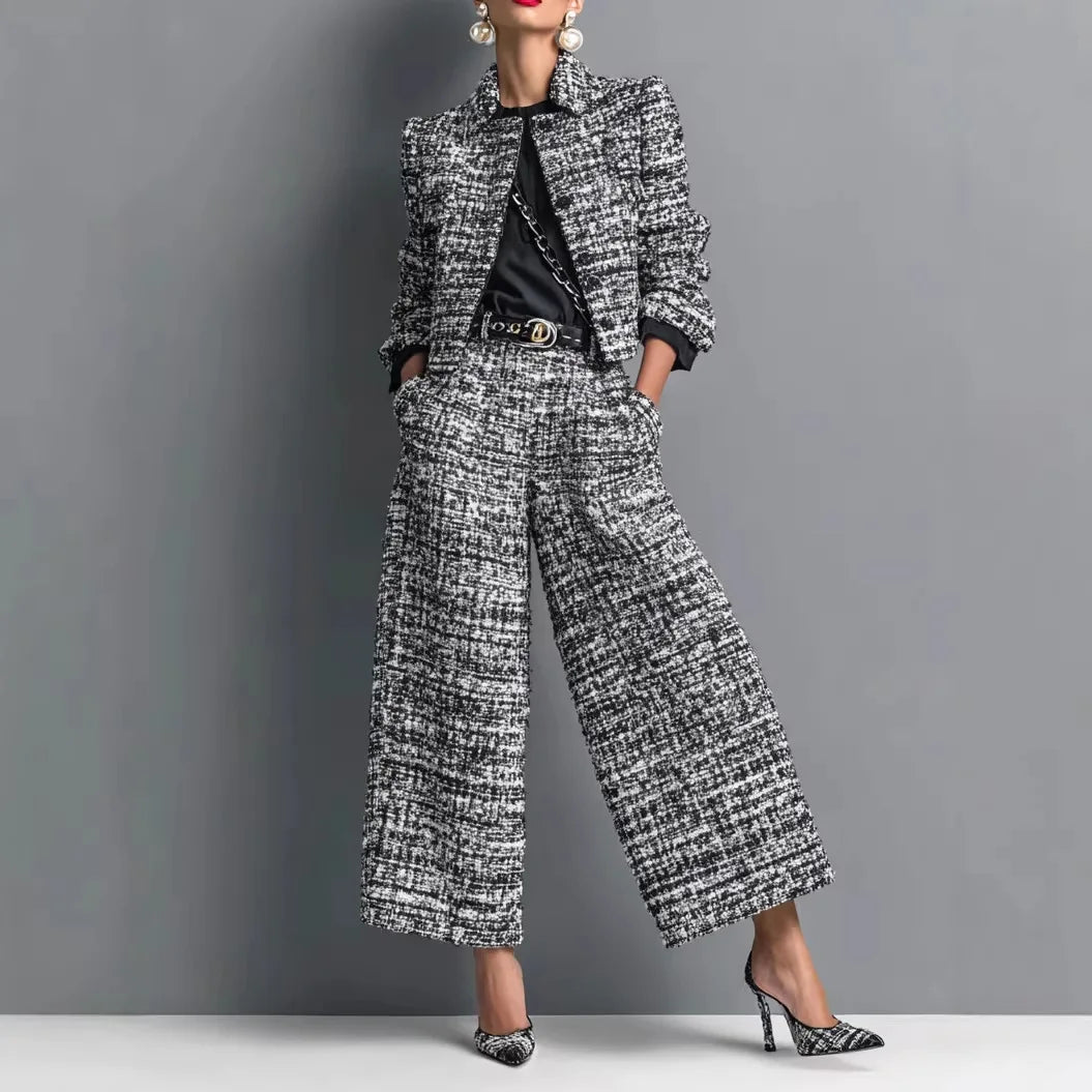 Light blue women's 2-piece set with short jacket from Corporación Turística, featuring a stylish and modern design.