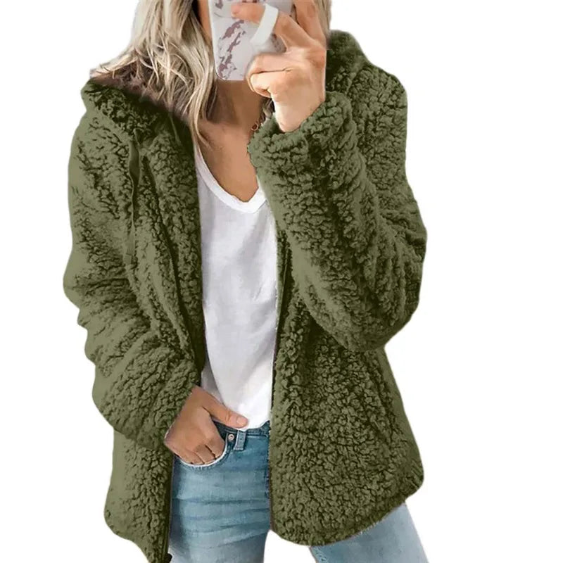 Light grey women's thick coat with hood and zipper by Corporación Turística, shown from the front in a close-up view.