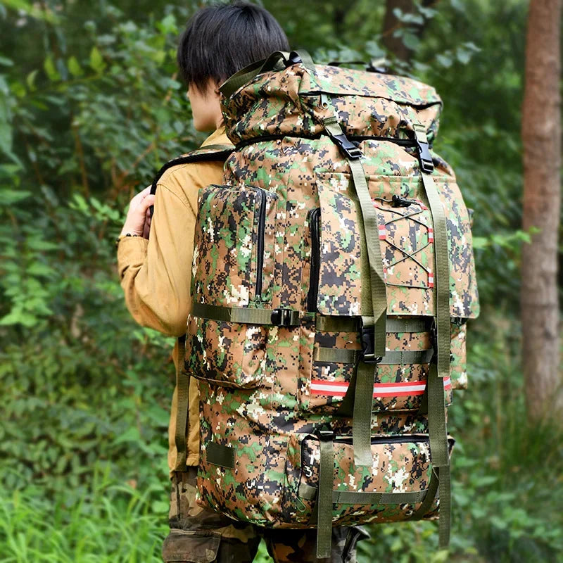 Large 130L hiking and camping backpack by Corporación Turística, shown with multiple compartments and adjustable straps.