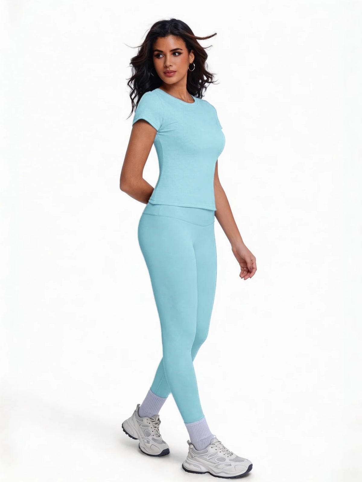Conjunto deportivo de 2 piezas para mujer con camiseta de manga larga en color marfil, de la marca Corporación Turística.