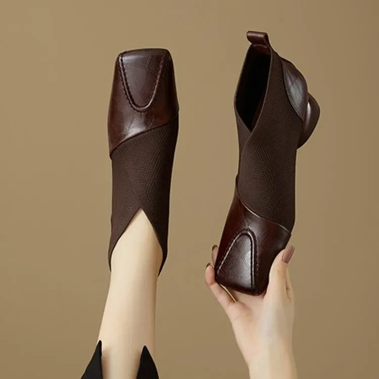 Brown ankle boots with block heel and square toe from Corporación Turística, shown on size 38.