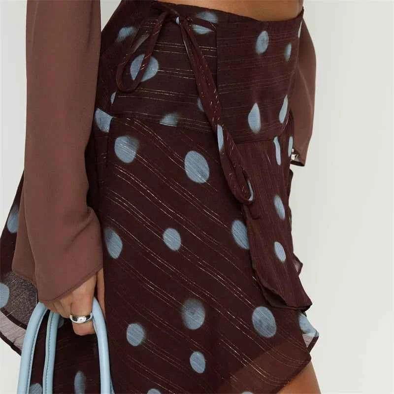Transparente minifalda de lunares para mujer en malla, de Corporación Turística, con diseño ajustado y estilo moderno.