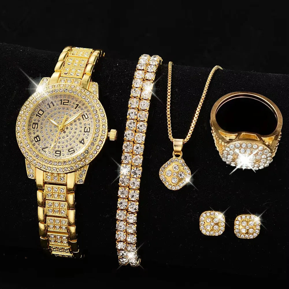 Stainless steel strap Roman numeral watch with diamond accents by Corporación Turística, close-up of watch face and band details.