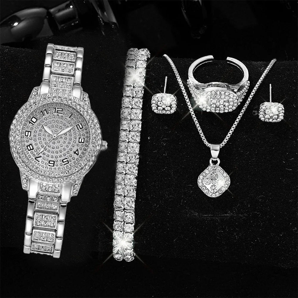 Steel strap Roman numeral dial watch with diamond accents by Corporación Turística, featuring a sleek design and elegant detailing.