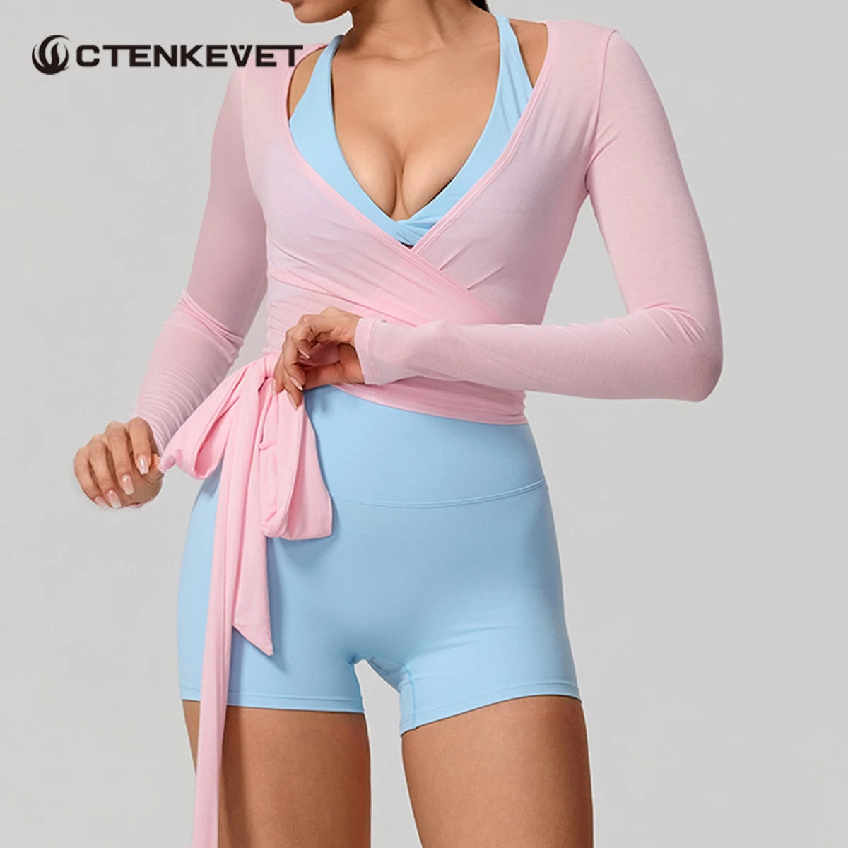 Long-sleeve summer yoga top for women by Corporación Turística, featuring a milk tea design and comfortable fit.