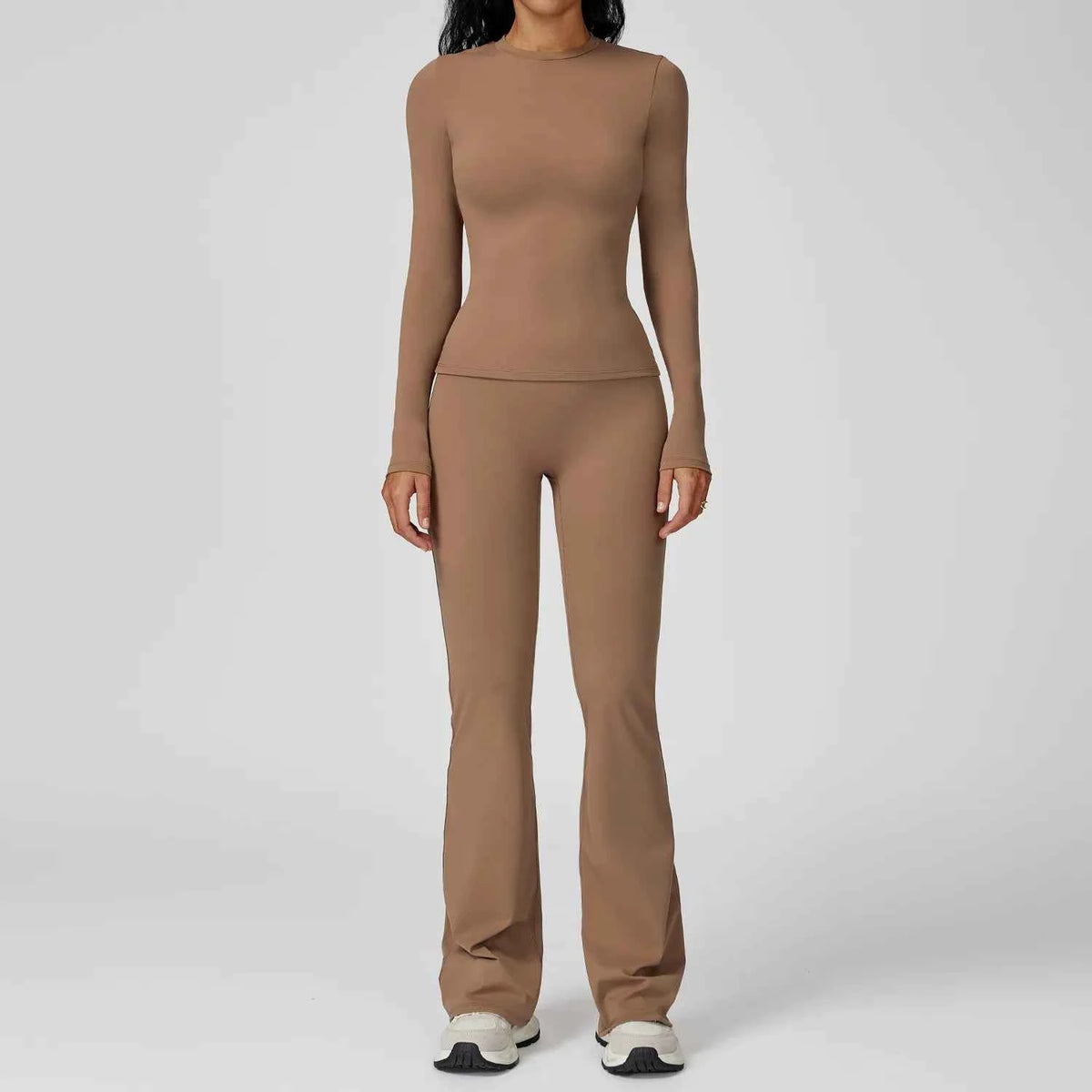 Mocha brown yoga set with two pieces from Corporación Turística, featuring comfortable athletic wear for workouts and relaxation.