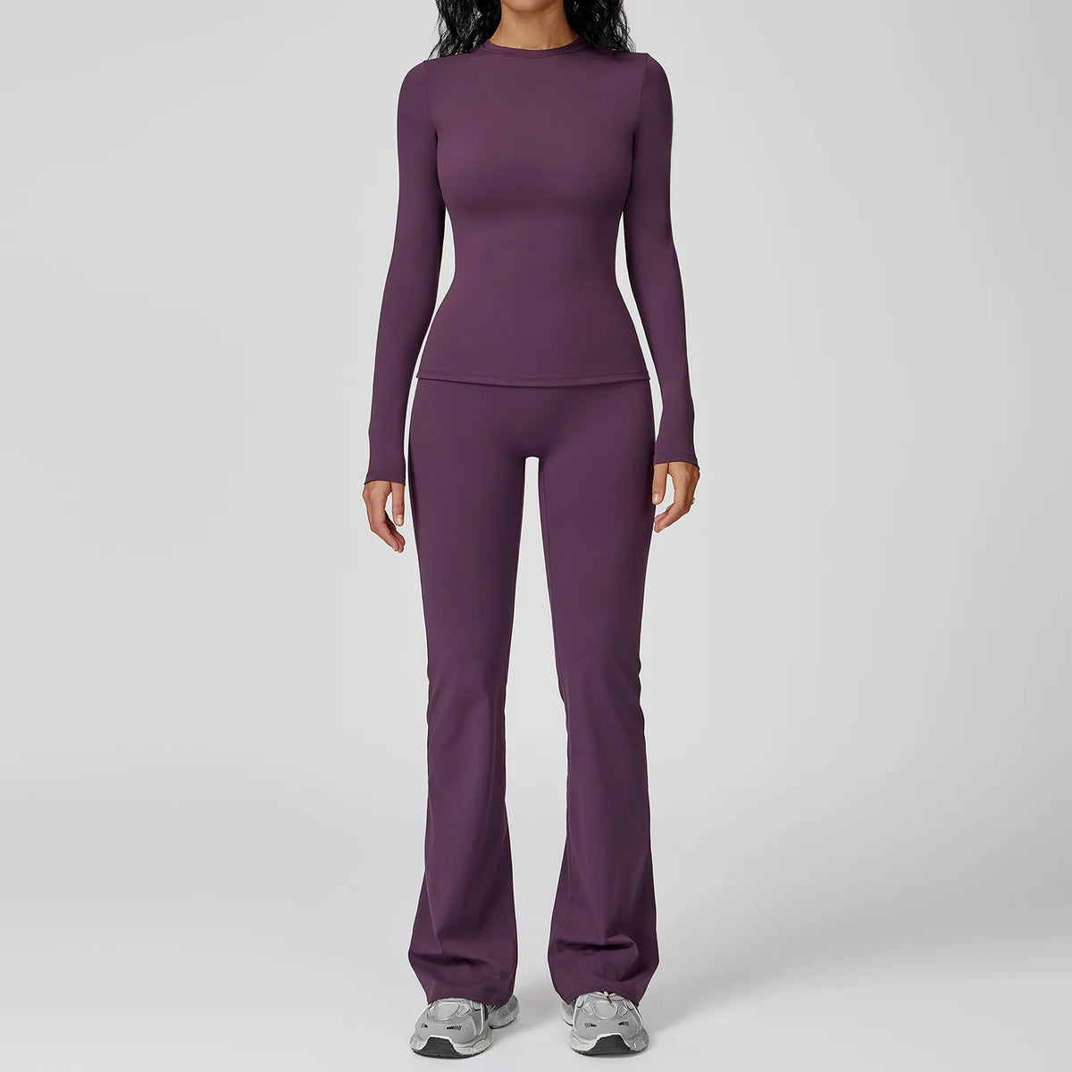 Mocha brown yoga set with two pieces from Corporación Turística, featuring comfortable sportswear for active wear and workouts.