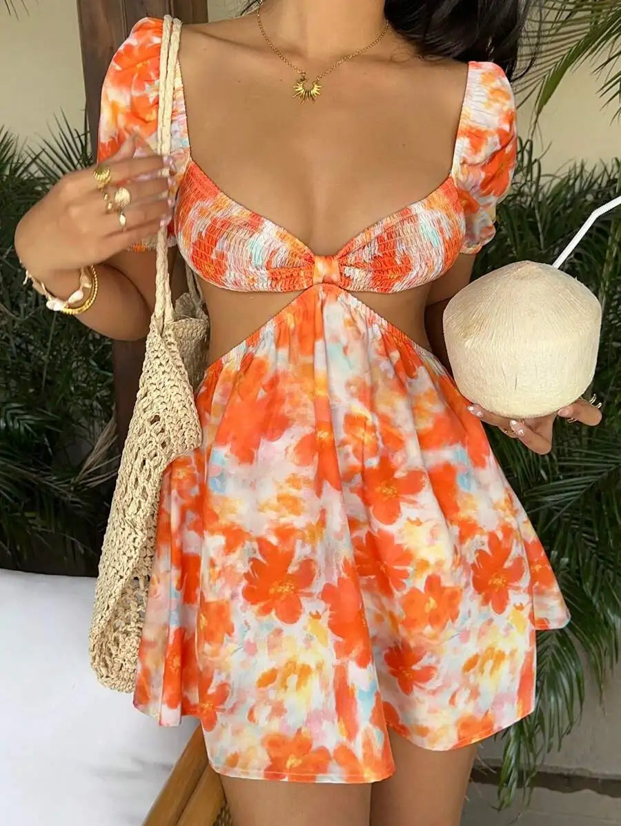 Orange mini dress for women, informal and versatile, with a colorful print, designed by Corporación Turística.