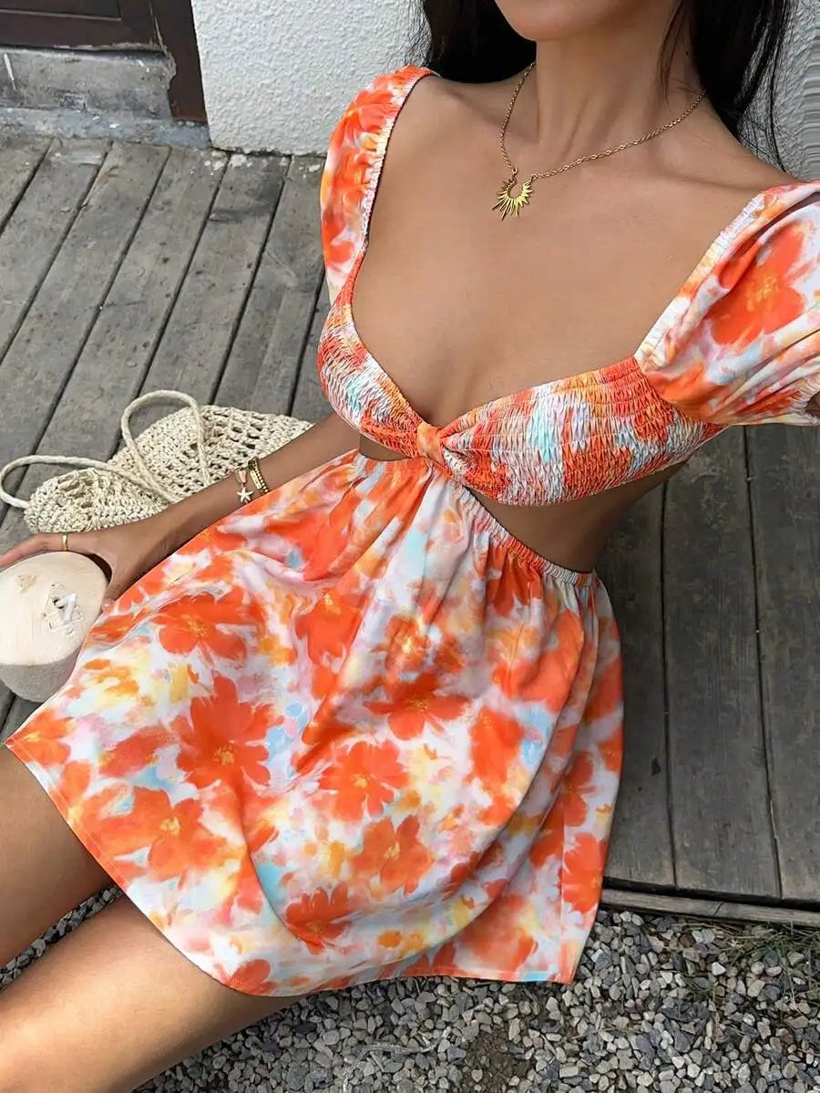 Orange mini dress for women by Corporación Turística, casual and versatile with a stylish floral print, perfect for informal occasions.