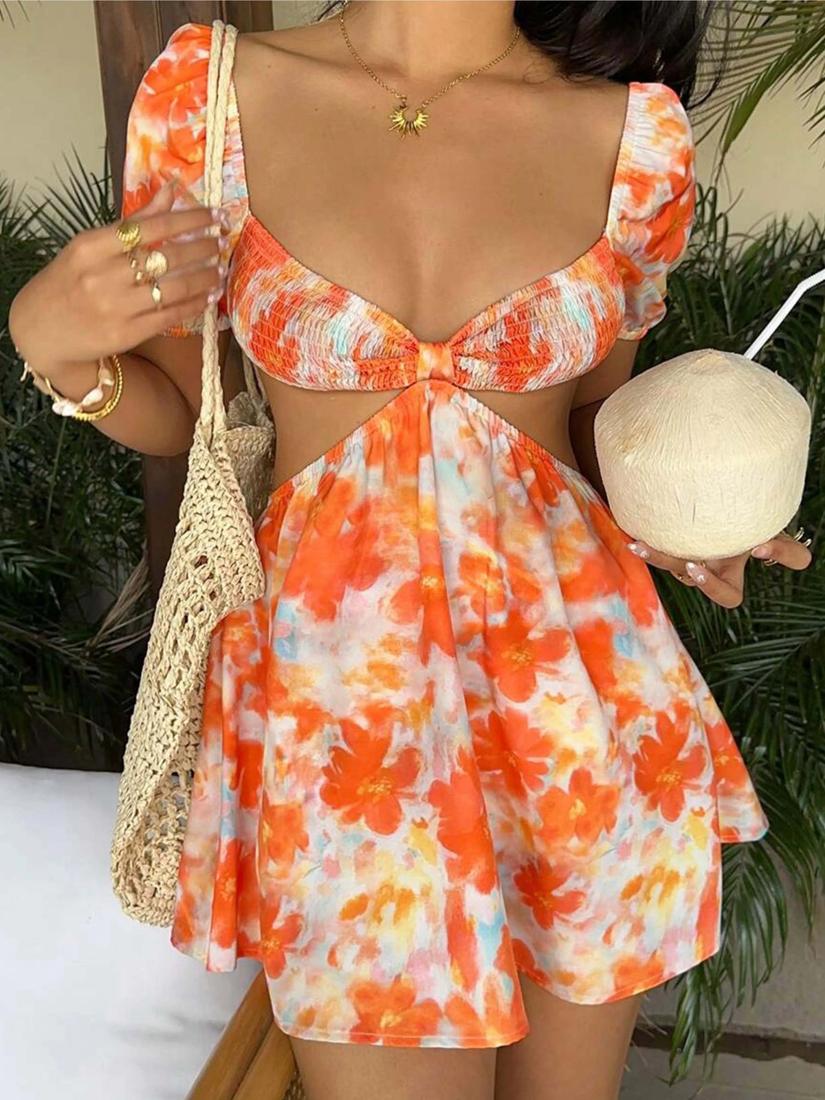 Orange mini casual dress for women by Corporación Turística, featuring a stylish and versatile printed design.