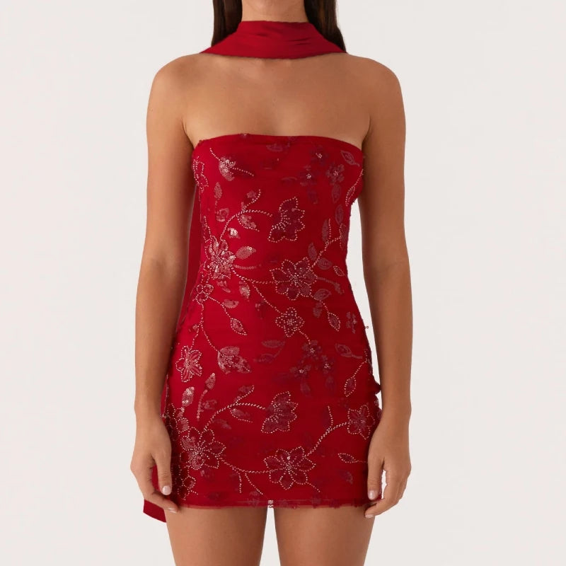 Orange summer mini dress with shiny pearl embellishments, stylish and sexy, ideal for warm weather occasions.