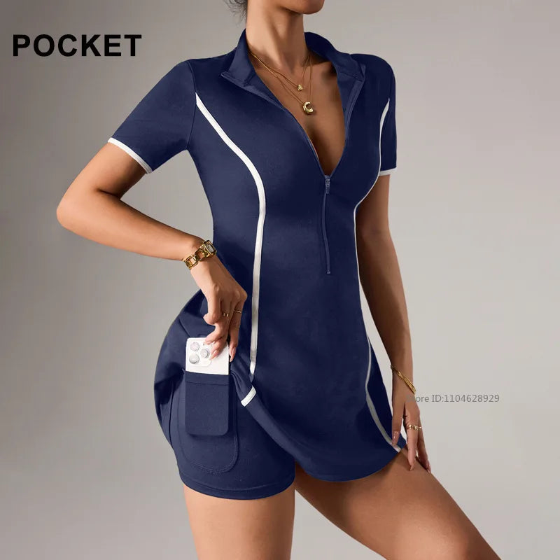 Navy blue women's tennis dress with short sleeves and polo collar, from Corporación Turística, designed for active sportswear.