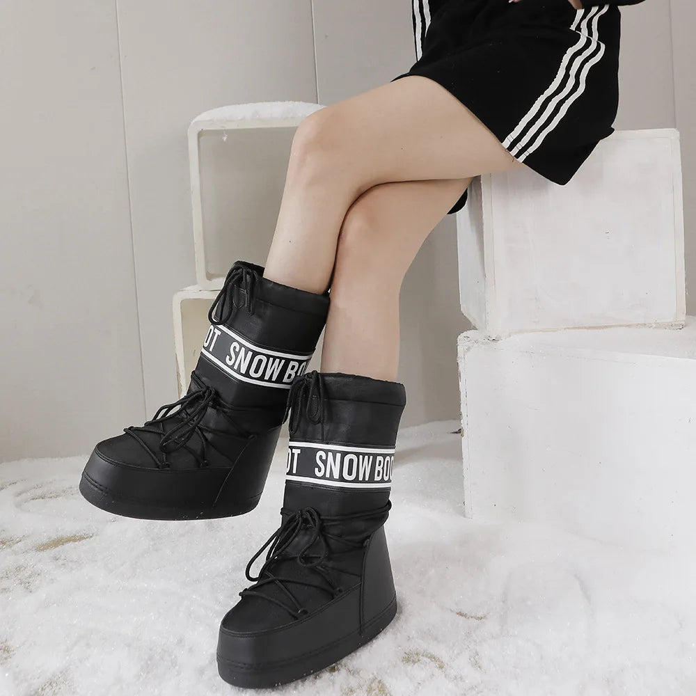 Black women's winter snow boots by Corporación Turística, mid-calf length, warm and waterproof for cold weather.