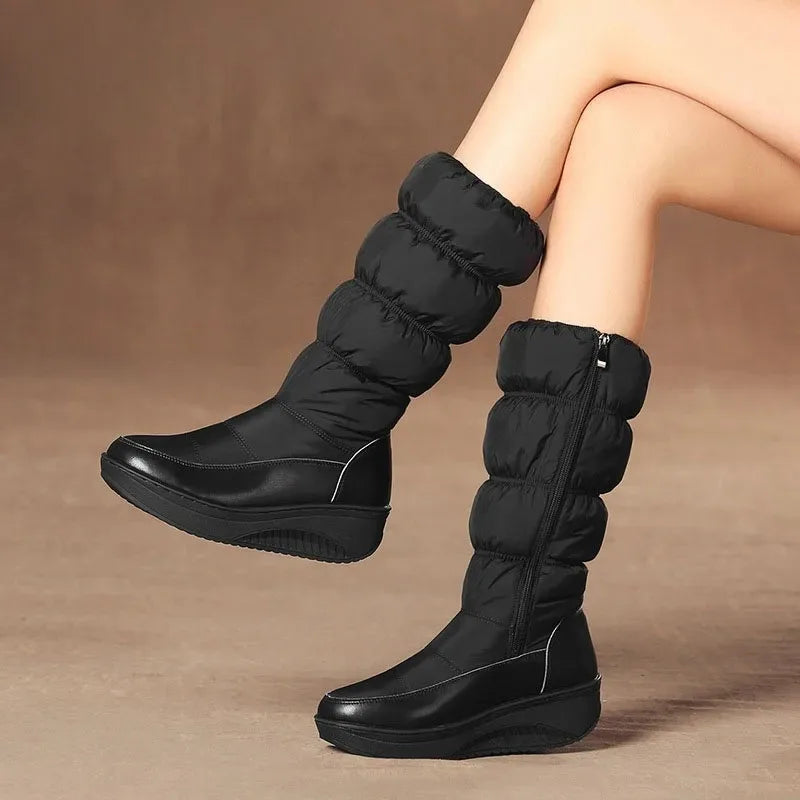 Black women's waterproof snow boots with platform sole by Corporación Turística, featuring sturdy construction and winter-ready design.