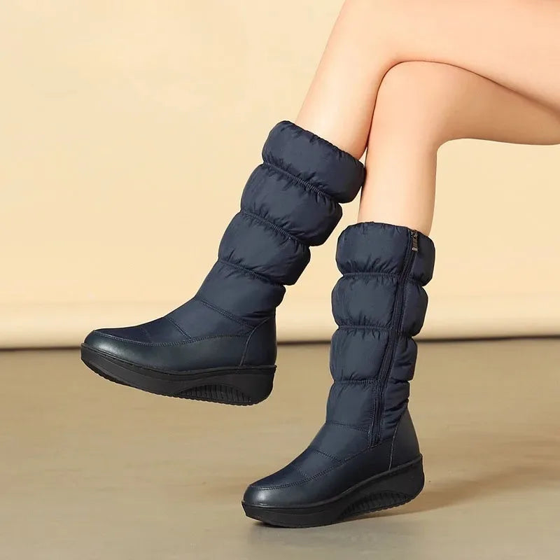 Black women's waterproof snow boots with platform sole from Corporación Turística, featuring sturdy design for winter weather.