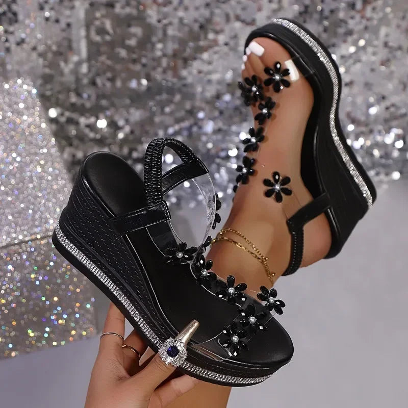Decorative black sandals with floral imitation diamond embellishments, featuring stylish design and comfortable straps.