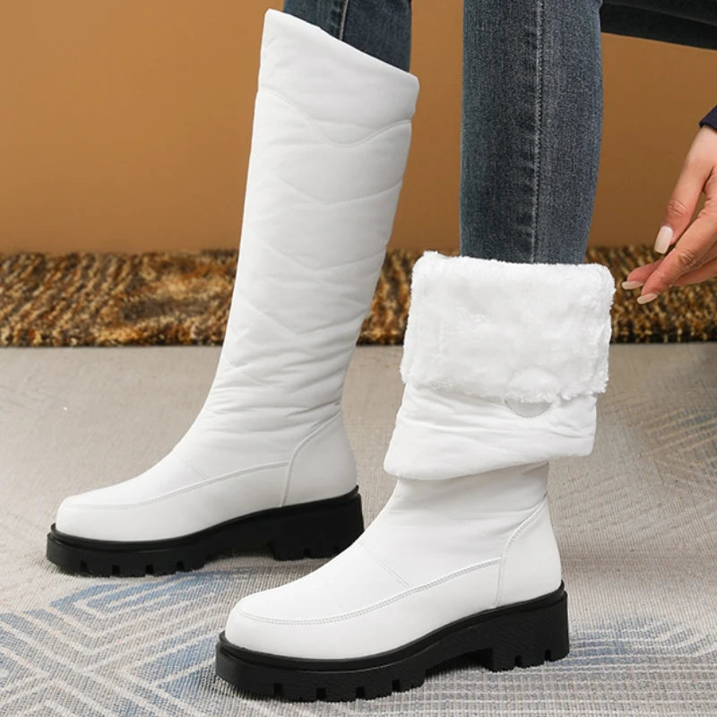 White warm leather snow boots for women by Corporación Turística, featuring a cozy design and sturdy sole for winter wear.