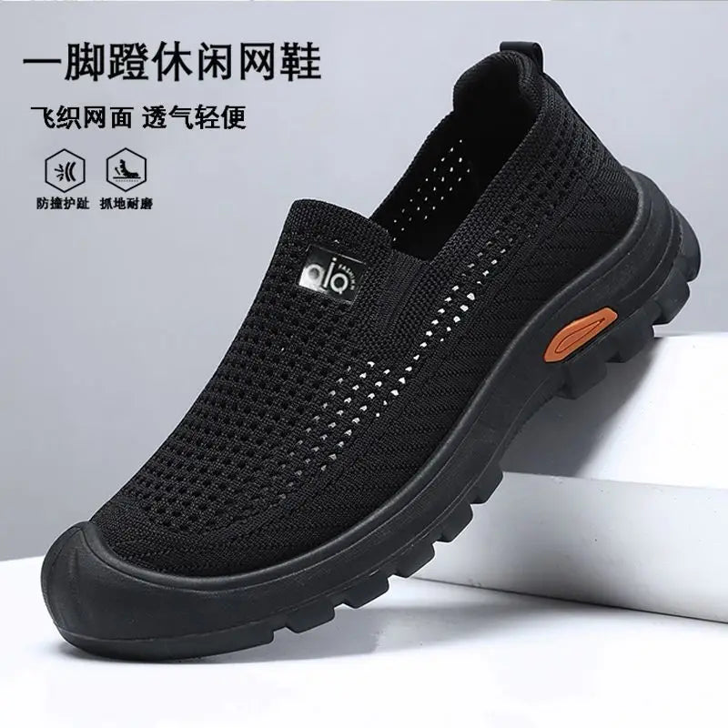 Men's breathable summer mesh shoes by Corporación Turística in black, size 44, designed for comfort and ventilation.