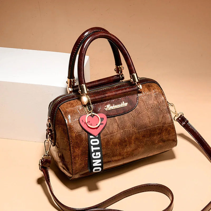 Luxury designer black shoulder bag for women, stylish and elegant with structured shape and high-quality craftsmanship.