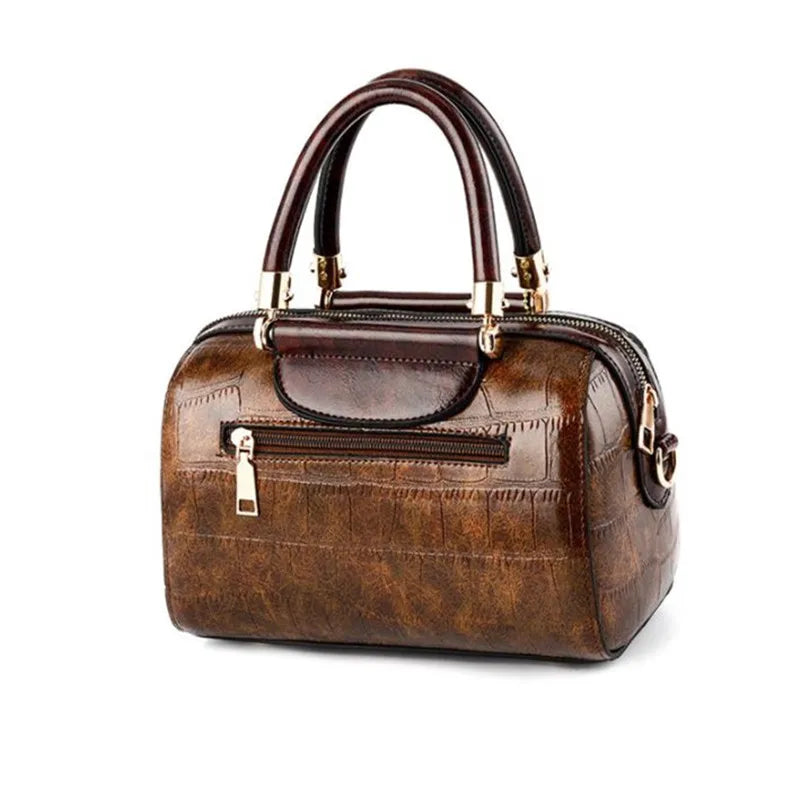 Luxury designer women's shoulder bag in black with elegant detailing, stylish and spacious for everyday use.