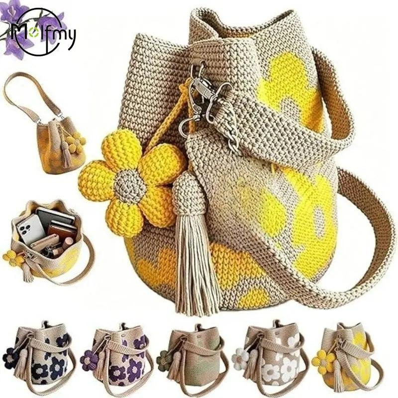 Handmade black crochet handbag with floral accents, crafted by Corporación Turística, showcasing intricate crochet and colorful flower details.