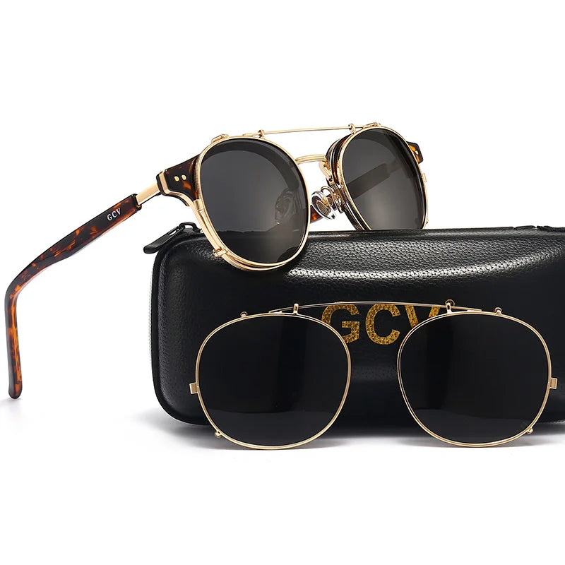 Black and gold GCV sunglasses with removable double-layer lenses, stylish frame, and modern design by Corporación Turística.
