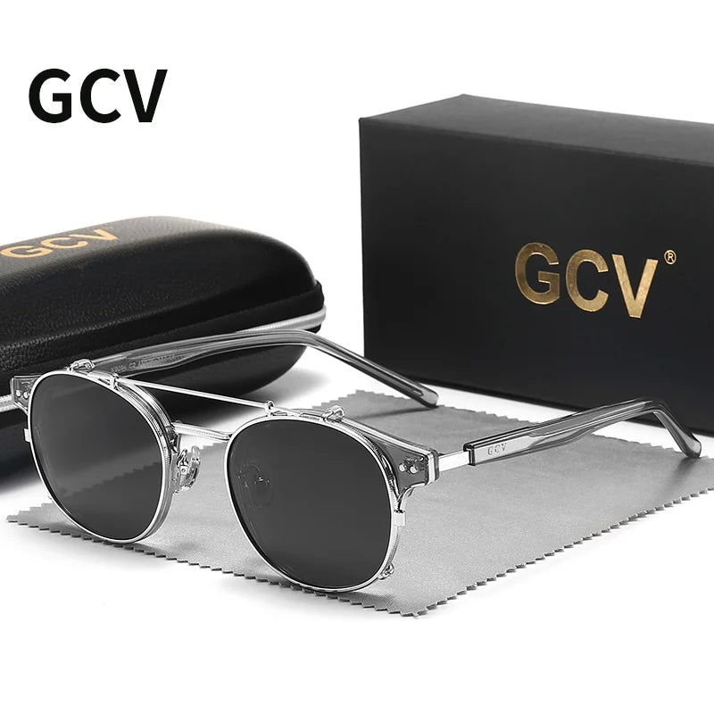 Black and gold GCV sunglasses by Corporación Turística with removable double-layer lenses, stylish and modern eyewear.